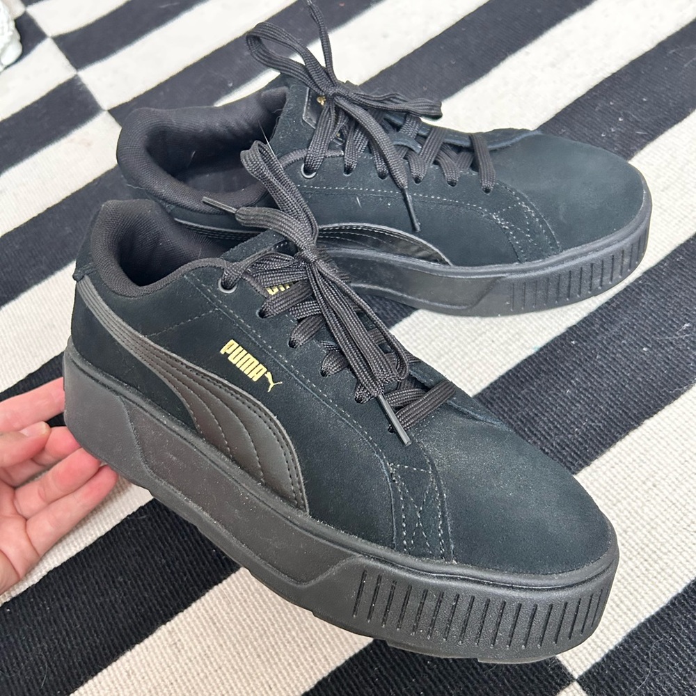 Puma Women's Black and Gold Platform Sneakers